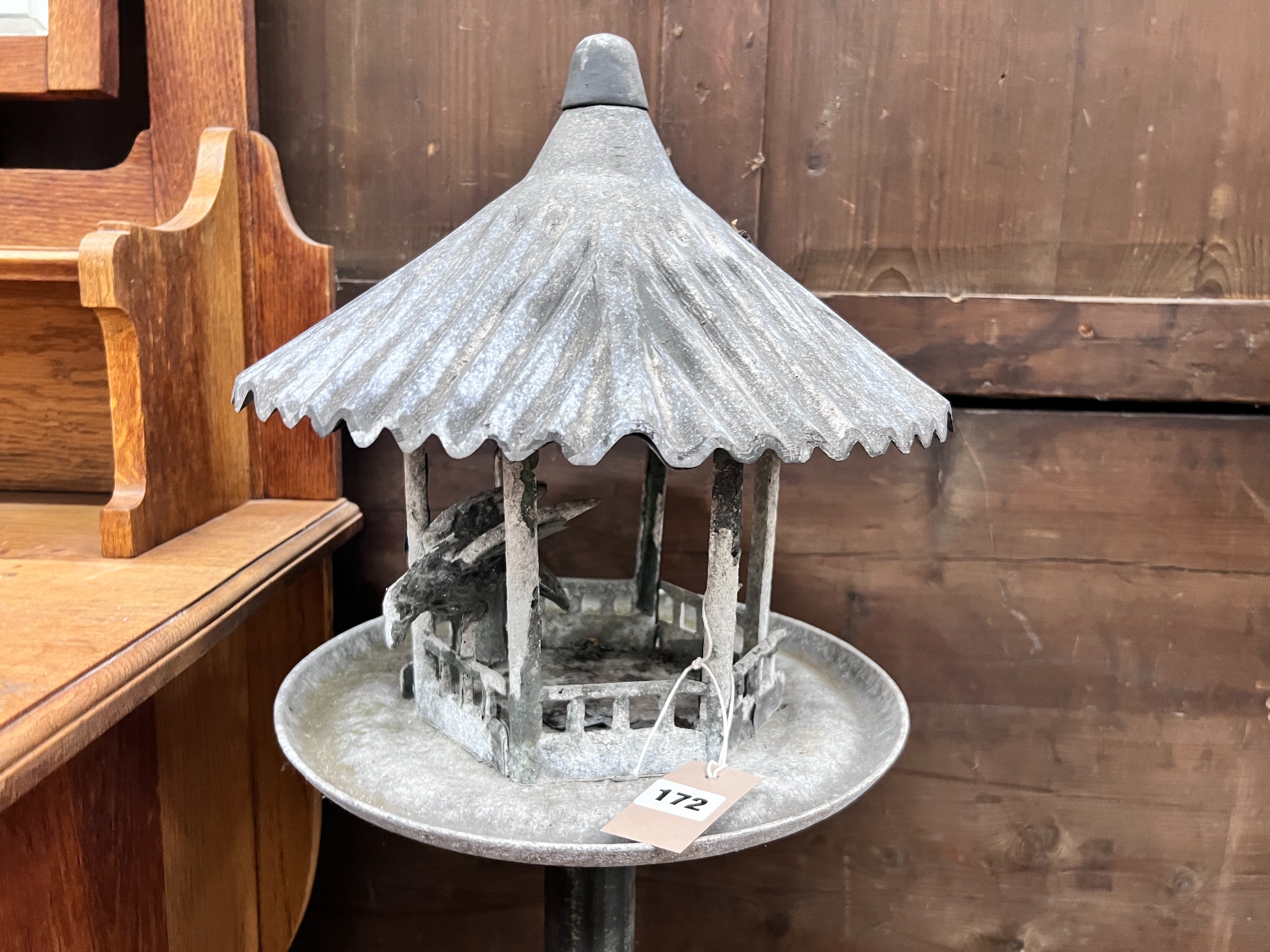 A cast iron and galvanised metal garden lantern / bird table, height 110cm *Please note the sale commences at 9am.